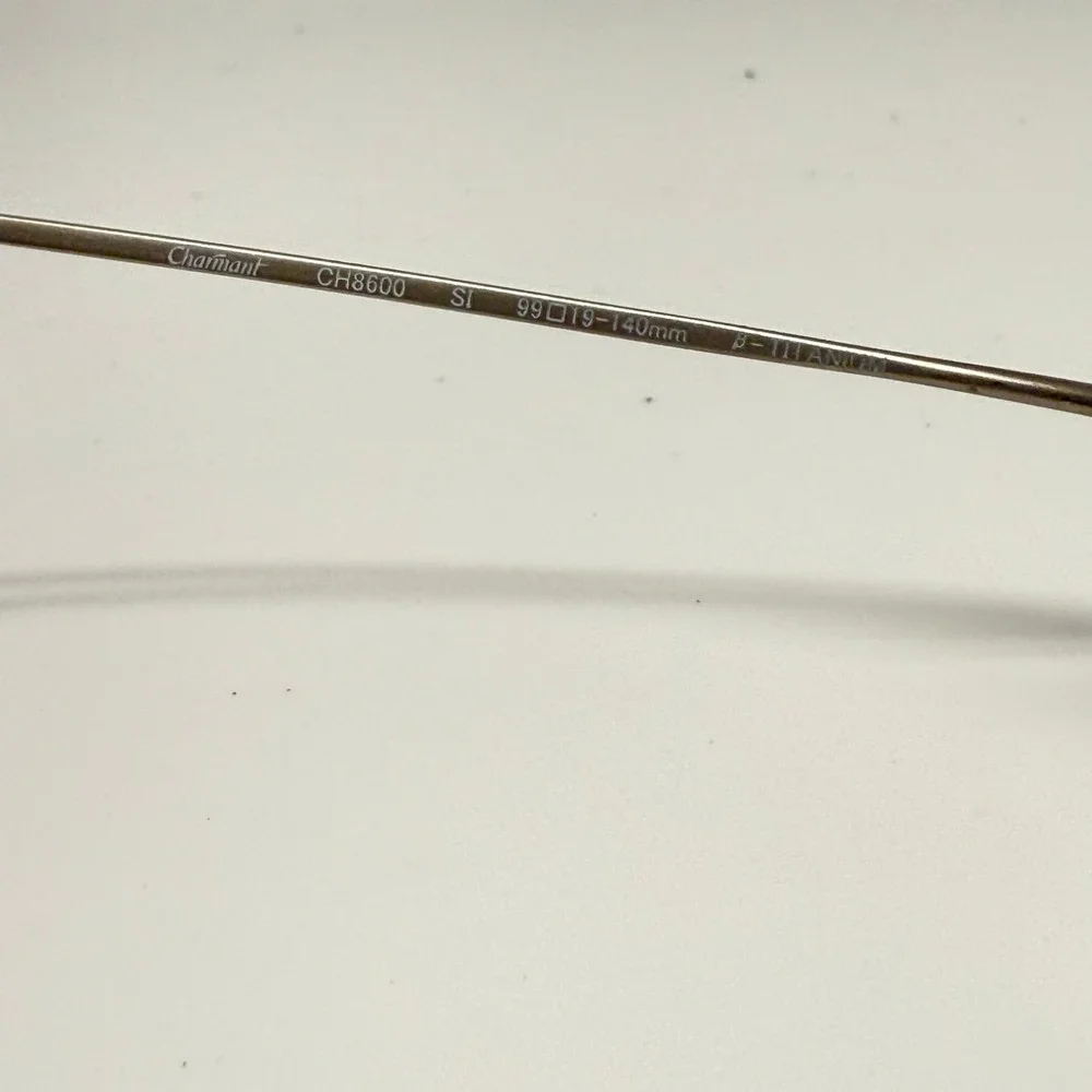 Charmant CH8600 Silver Beta Titanium Rimless Eyeglass Frames 49-19-140mm